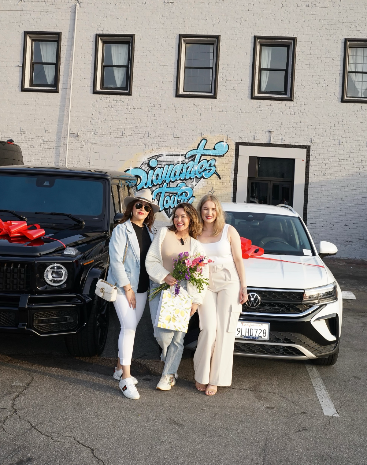 2024 G-Wagon winner Adelina Caro and Volkswagen Taos winner Celeste Robles